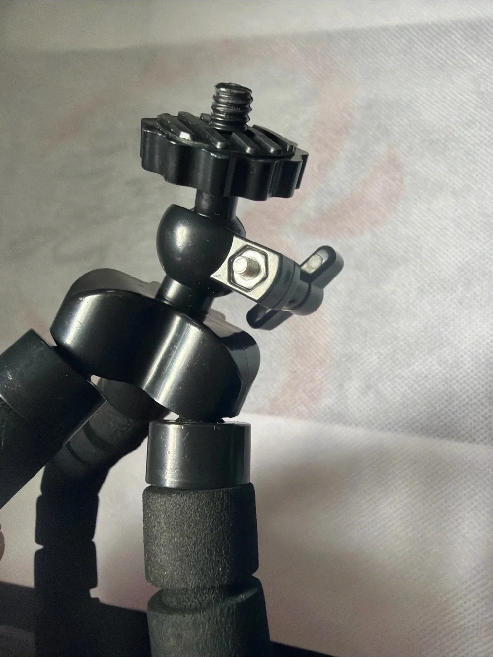 Compact Black Mini Tripod for Cameras and Video